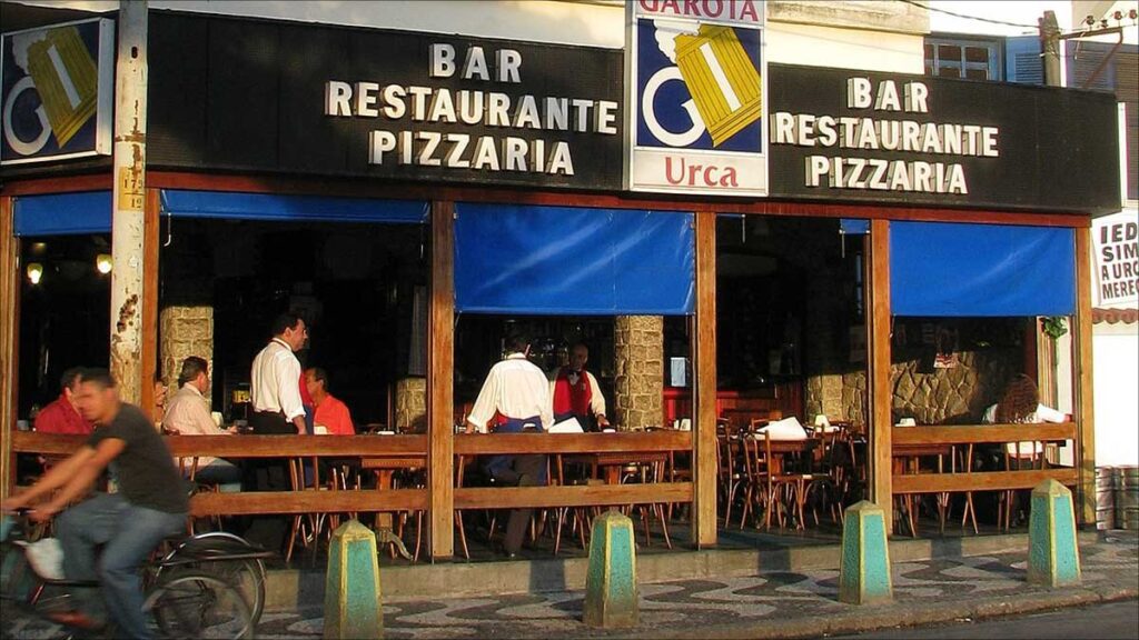 Connect Brazil Guide: Garota da Urca Bar is open to the sidwalk that borders Rio's expansive Guanabara Bay. 