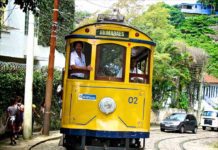 Yellow Cable Car on the cobblestone steets of Santa Teresa, Rio de Janeiro, Brazil.