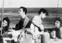 Joao Gilberto and Antonio Carlos Jobim with a pair of French actresses., Ipanema beach , RIo de Janeiro