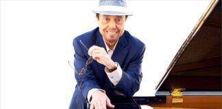 The Sounds of Brazil’s meet and greet with Sergio Mendes, pictured next to his grand piano.