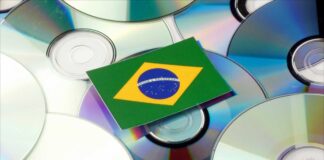 brazilian flag on top of silver cds