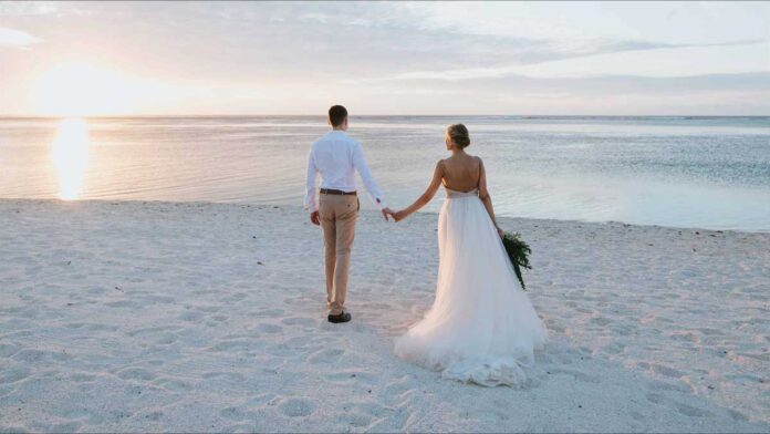 Newlyweds - A groom and bride beach weeding