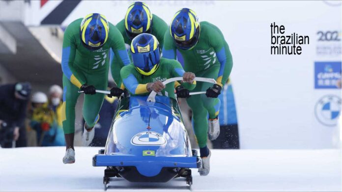 four people push a blue color3d bobseld at the winter olympic games