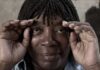 The Milton Nascimento Streaming Channel. Nascimento cups his hands around his eyes while smiling.