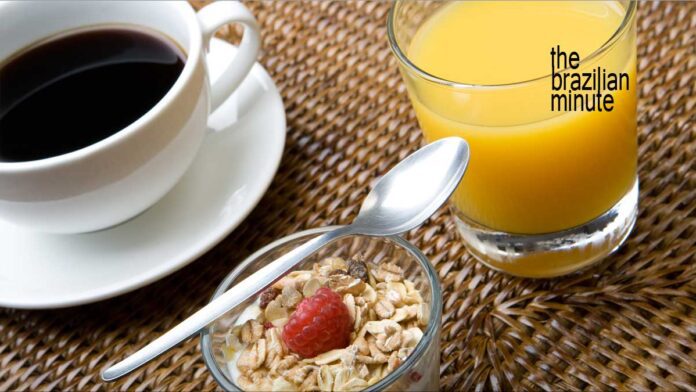 Brazil and your Breakfast. A white cup of black coffee and a glass of orange juice symbolize Brazil as the world leader in both.