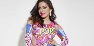 Brazil’s Latin Grammy nominees for 2022 includes Anitta, wearing a colorful comics-style sapndes bodysuit.