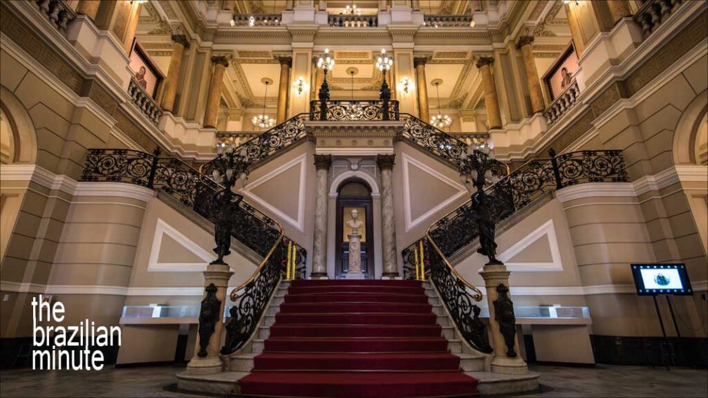 Brazil's Literary Masters. The Interior of National Library of Brazil, in Rio de Janeiro features an open foyer with a wide red-carpeted staircase.