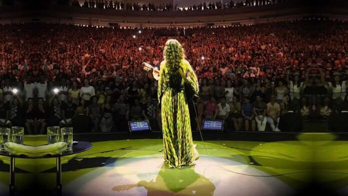 Marisa-Monte-04 March salutes Brazils women of song, including singer Marisa Monte who faces the audience while performing.
